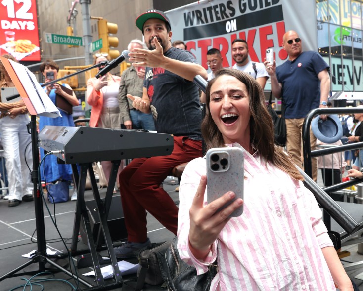 Lin-Manuel Miranda and Sara Bareilles performing at the WGA strike